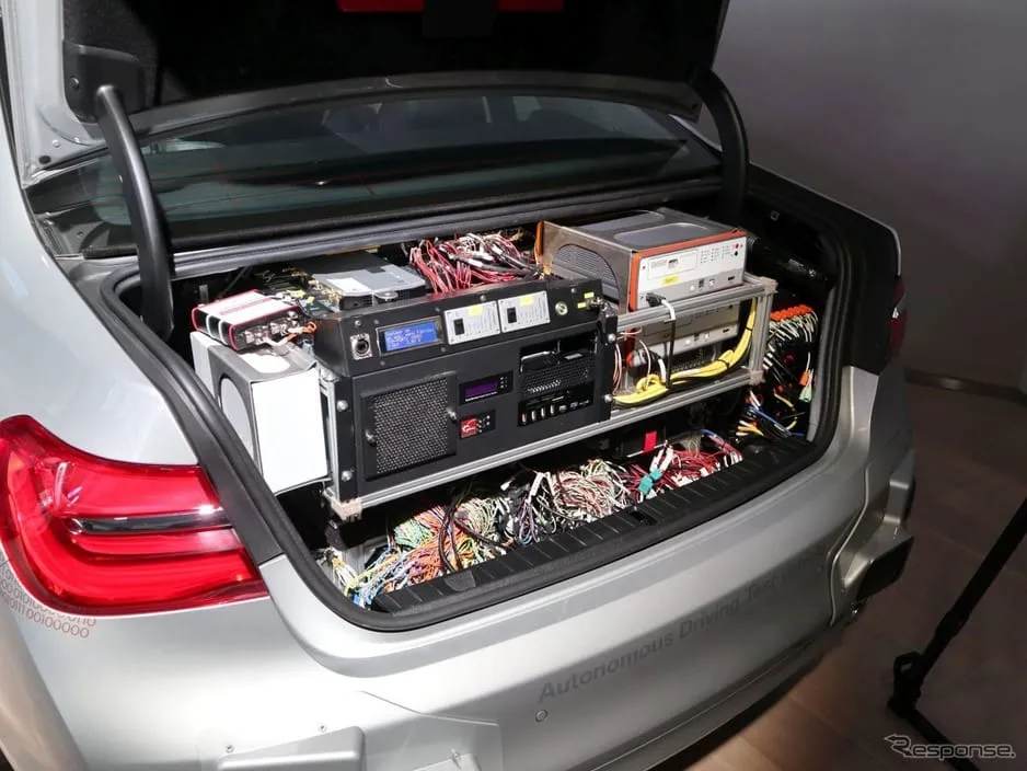 The trunk is filled with devices such as data logger and I/O unit of sensor channel "BMW Personal Copilot System in the 7-Series Trunk"